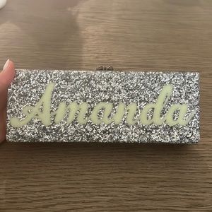 Eddie Parker Monogrammed Glow in the dark clutch